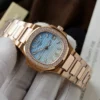 Patek Philippe Nautilus 7010R Women 32mm Blue/White Dial Metal Wire - Image 4