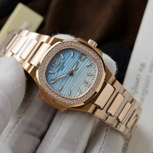 Patek Philippe Nautilus 7010R Women 32mm Blue/White Dial Metal Wire - Image 4