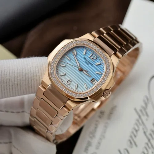Patek Philippe Nautilus 7010R Women 32mm Blue/White Dial Metal Wire - Image 5