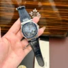 Patek Philippe Nautilus 5724 Blue Dial Bezel Stone Blue Baguette CZ 40mm