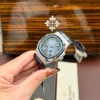 Patek Philippe Nautilus 5724 Blue Dial Bezel Stone Blue Baguette CZ 40mm - Image 2